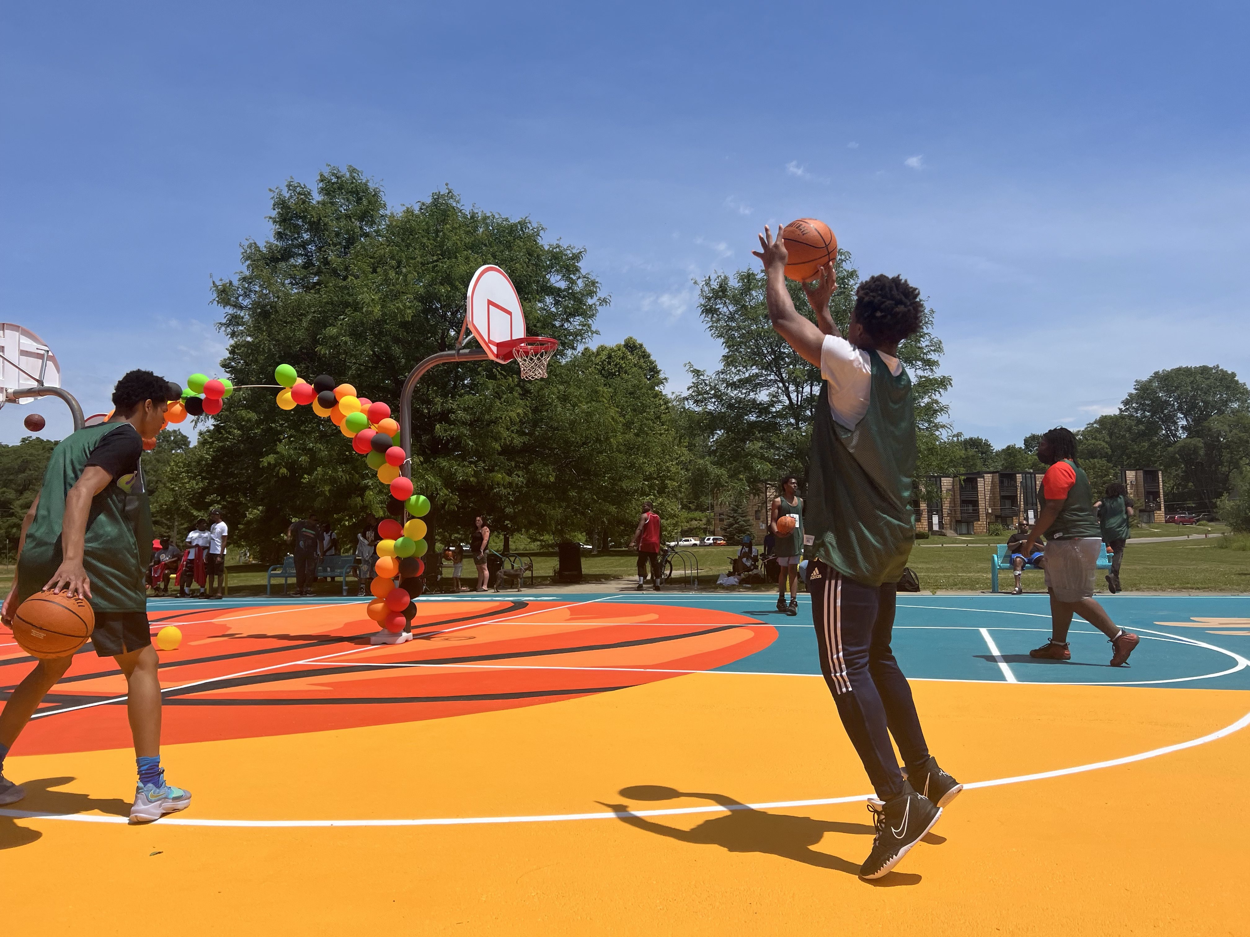 Tom Gores’ FlintNOW unveils ‘bright, vibrant’ refurbished basketball court as part of Juneteenth celebration