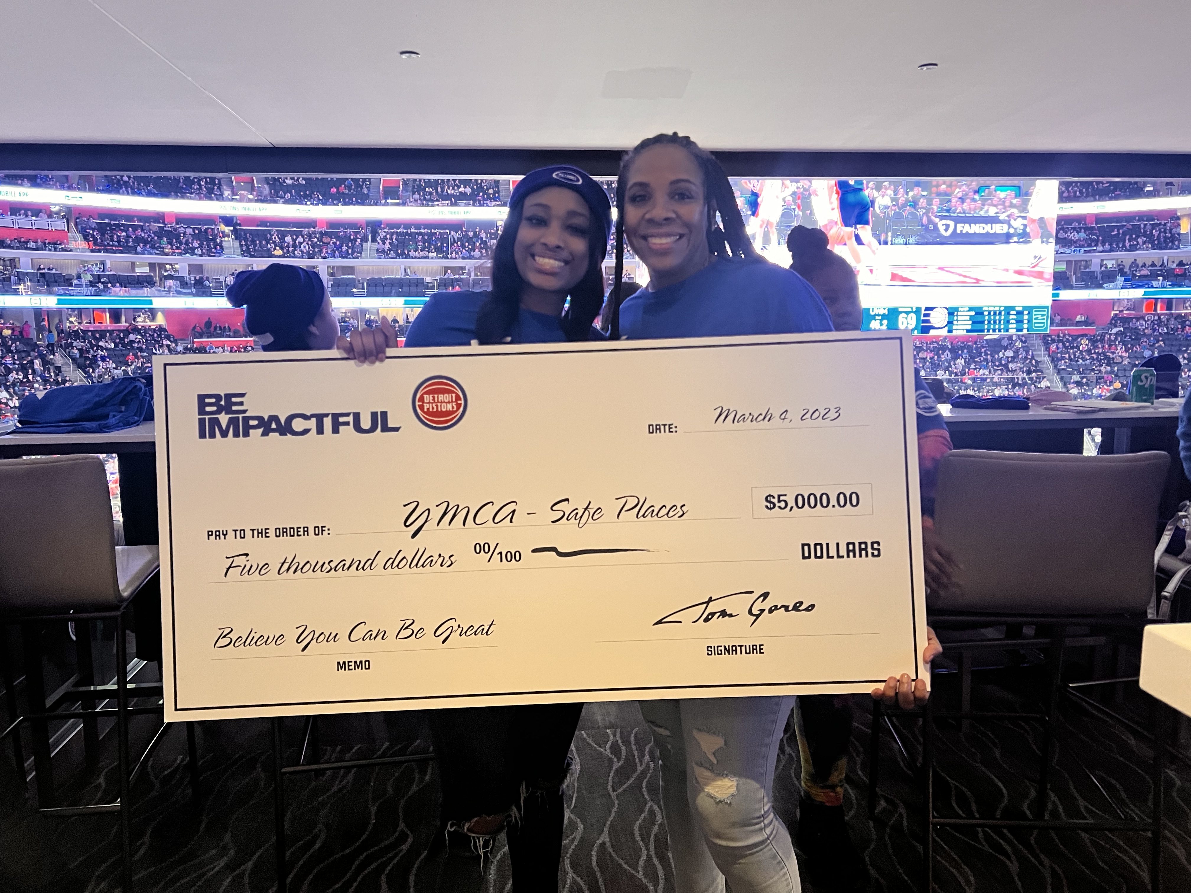 How Detroit Pistons owner Tom Gores provides the full game-night experience to Flint kids through ‘Be Impactful’ program