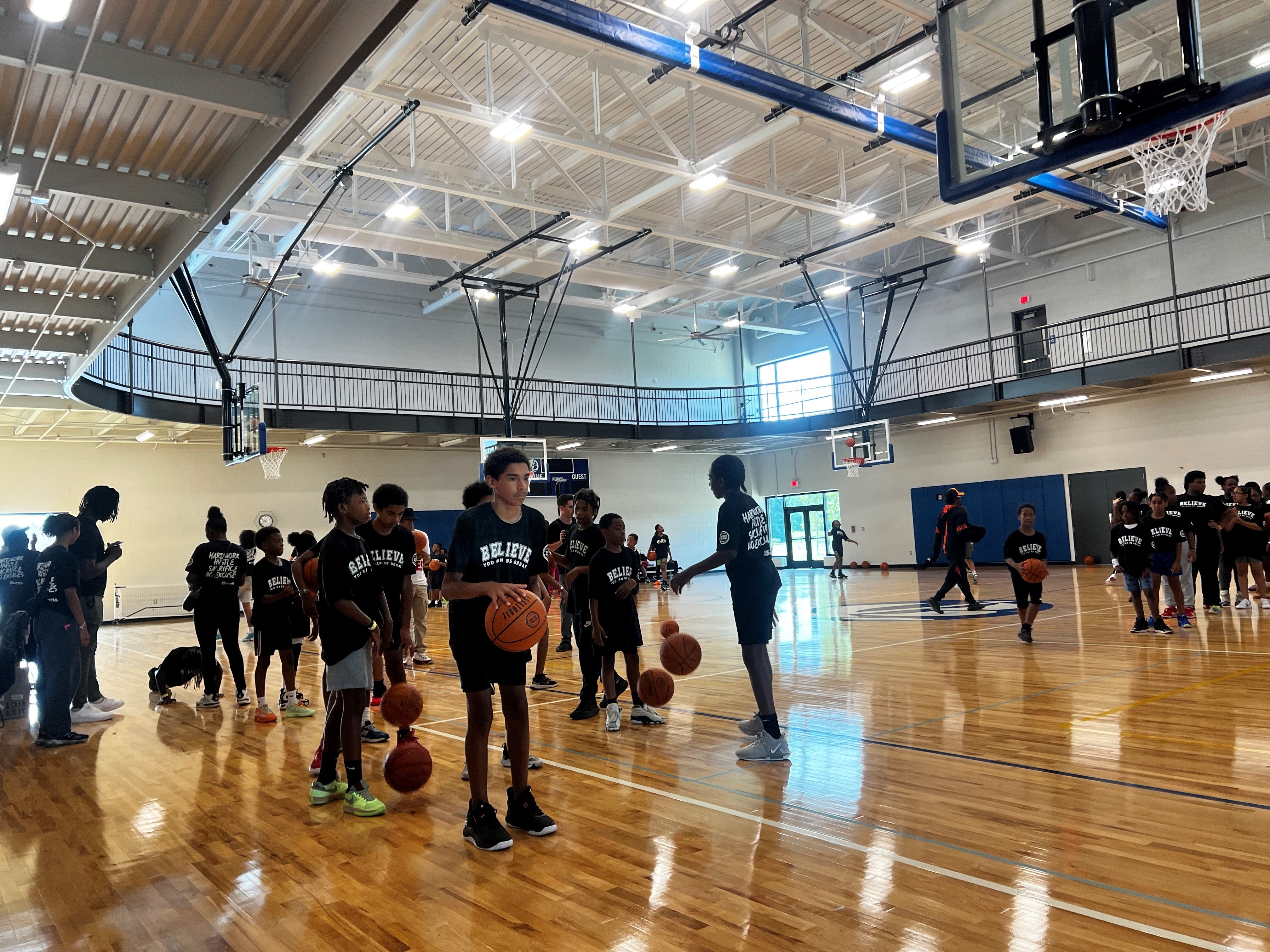 Tom Gores-sponsored basketball camps: ‘They’re learning how to work with others’ 