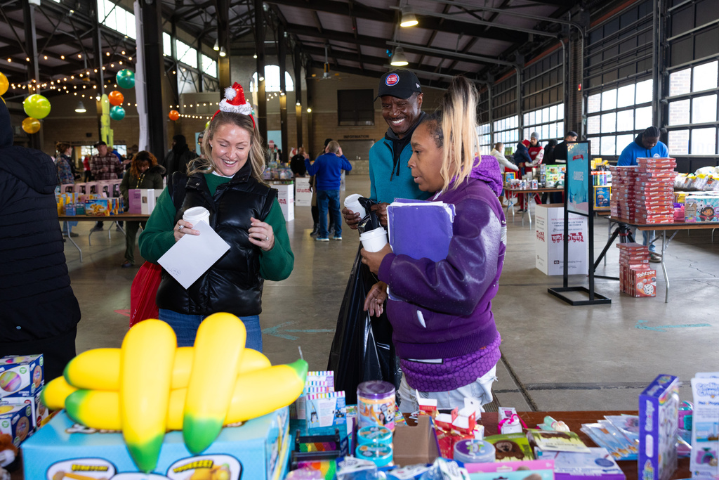 Tom and Holly Gores continue providing holiday cheer with annual Toys for Tots, Voices for Children giveaway events 