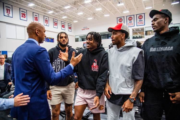 Detroit Pistons players greeting each other