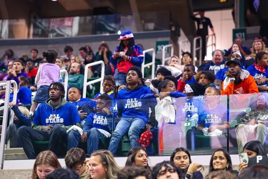 Teen youth at a Detroit Pistons game