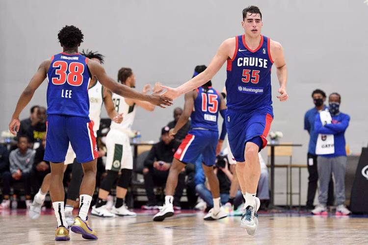 Motor City Cruise players congratulate each other