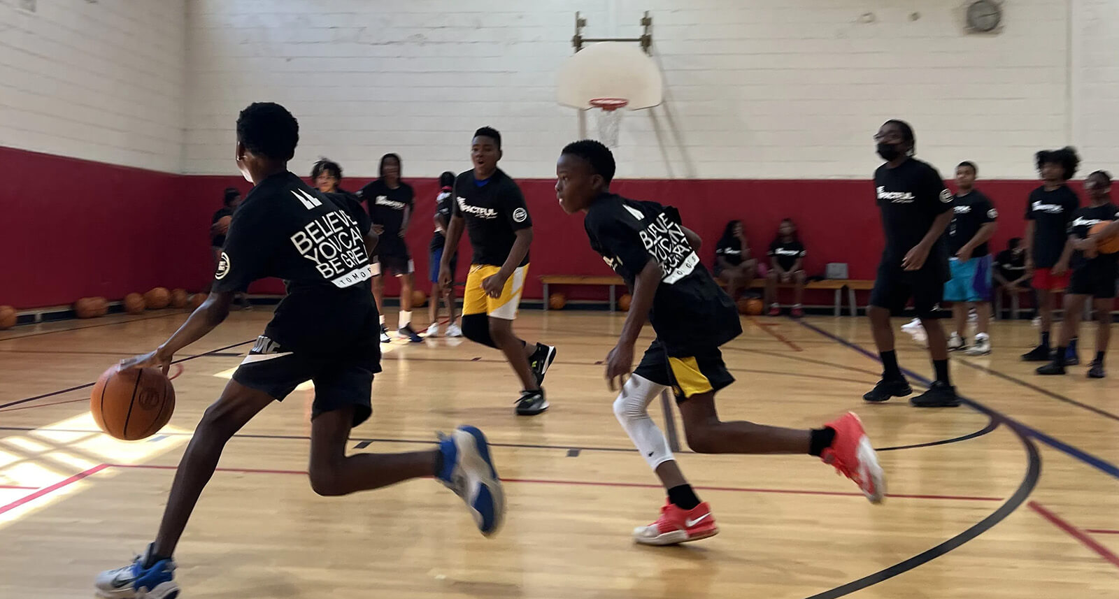 Youth playing basketball