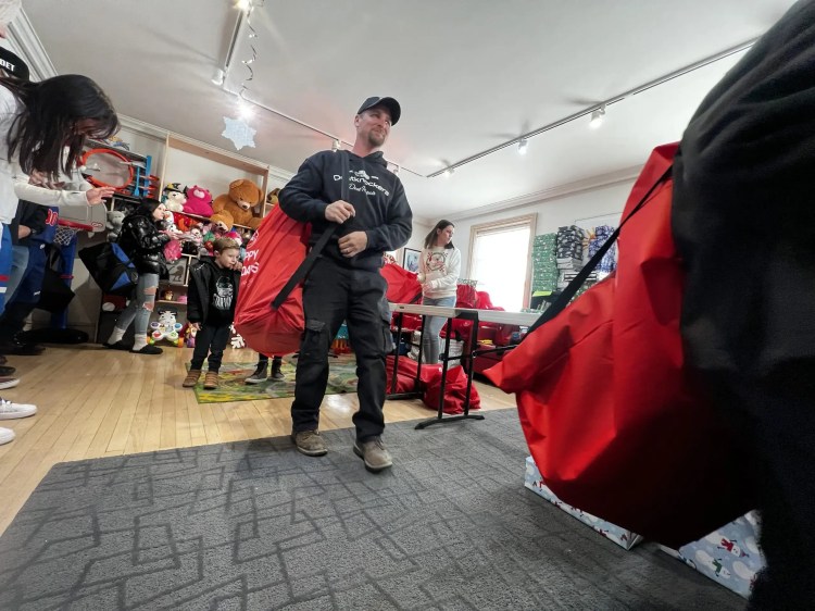 Setting up toys for annual Toys for Tots events