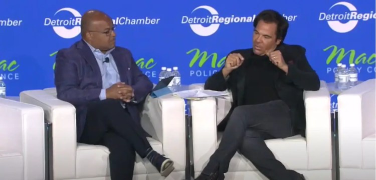 Tom Gores speaking at a press conference