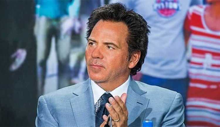 Tom Gores at a press conference