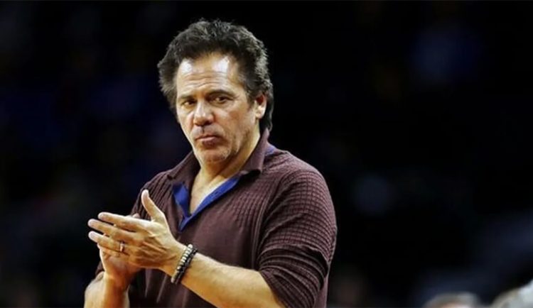 Tom Gores courtside at a Pistons game