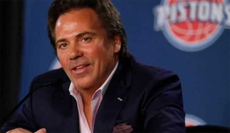 Tom Gores smiling at a Pistons press conference