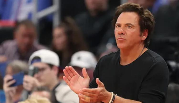Tom Gores courtside at a Pistons game