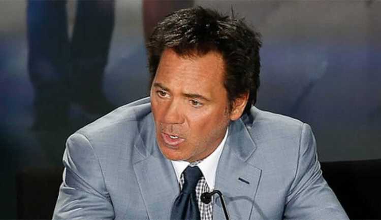 Tom Gores answers questions from the press