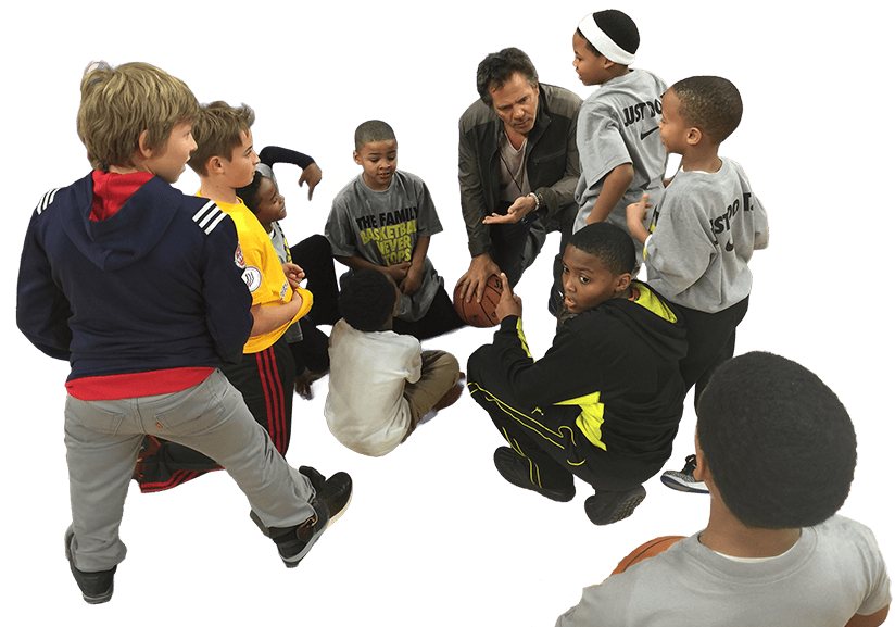 Tom Gores coaches kids on the court